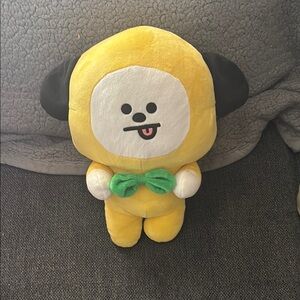 Charming Yellow and Black Stuffed Animal with Playful Expression